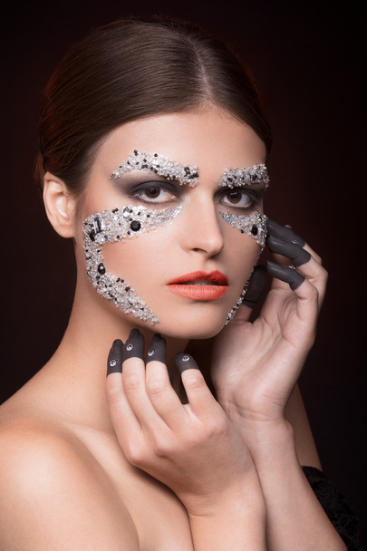 Beautiful sensual woman with face-art makeup - Foto, Imagen