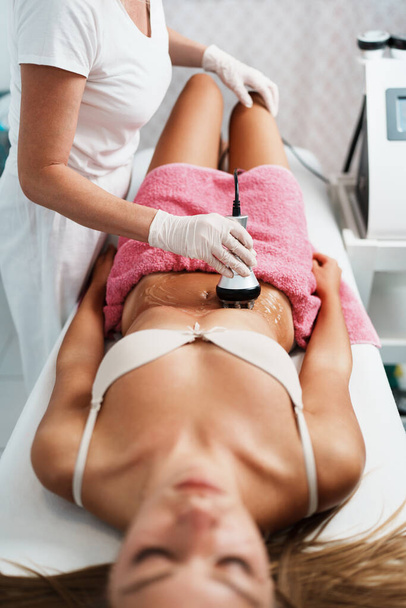 Cavitation RF body treatment and contemporary medicine for health beauty improvement and fat and cellulite removal - Valokuva, kuva