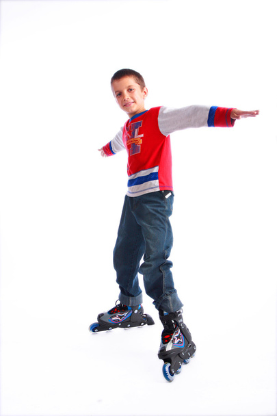 Poika rullaluistimilla
 - Valokuva, kuva