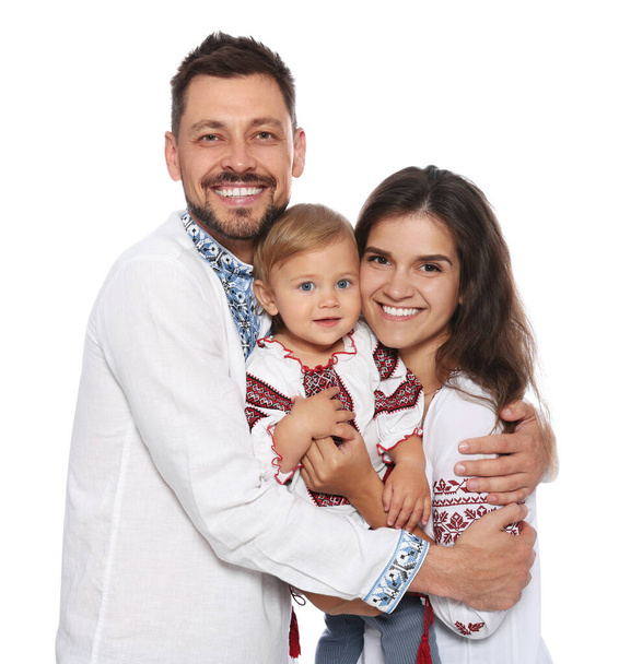 Happy family in Ukrainian national clothes on white background - Fotó, kép