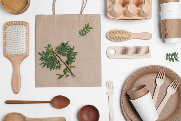 Different eco items on white background, flat lay. Recycling concept - Φωτογραφία, εικόνα