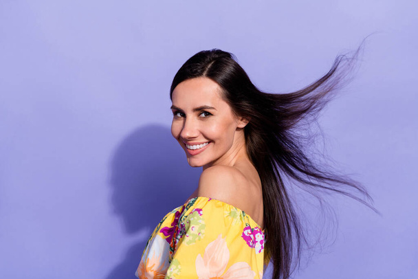 Photo of sweet funny girl dressed off shoulders blouse wind blowing empty space isolated purple color background. - Zdjęcie, obraz