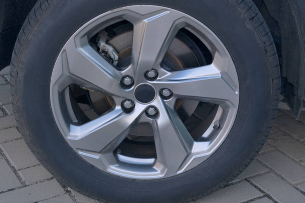 Car wheel protector, close up. Wheels of modern transport.  - Fotó, kép