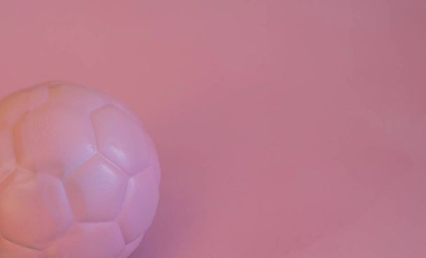 Ball Close-up. Stylish Ball on an Empty Pink Background. Copy Space for Text. - Photo, Image