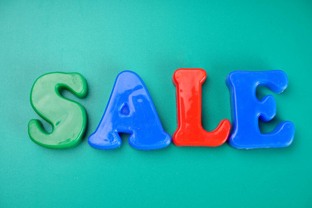 'Sale' word on green background - Foto, Imagen