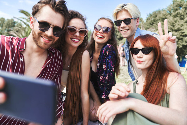 Group of friends make a selfie together  - 写真・画像