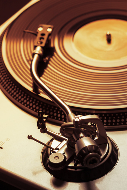 Old fashioned turntable playing a track - Photo, Image