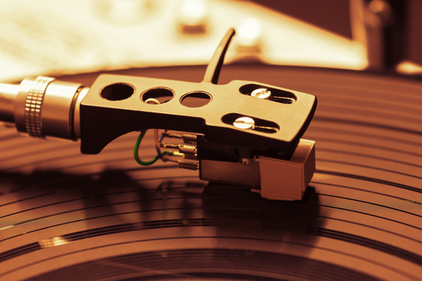 Old fashioned turntable playing a track - Photo, Image