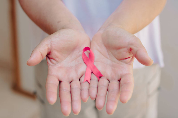 Mature White Woman With pink ribbon isolated. - Foto, Bild