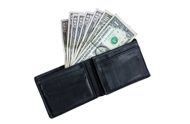 Money in the black leather wallet isolated on white background. Time to go shopping and buy things. Money addicted shopaholic. - Foto, Bild