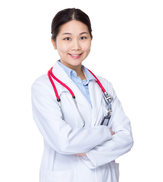 Female doctor with arms crossed - Фото, зображення