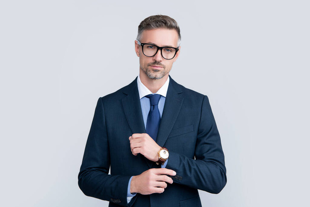 mature boss in formal suit with eyeglasses and wristwatch. - Foto, Imagem
