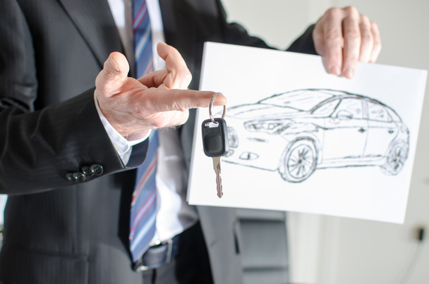 Salesman showing a car design - Photo, Image