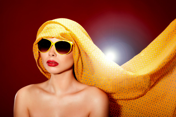 Beautiful woman in sunglasses and shawl. - Φωτογραφία, εικόνα