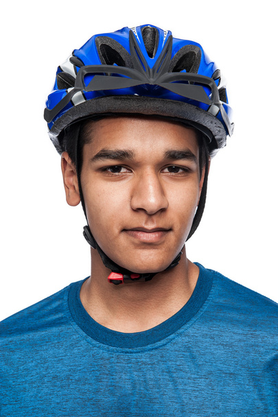 Niño en casco de bicicleta azul
. - Foto, Imagen