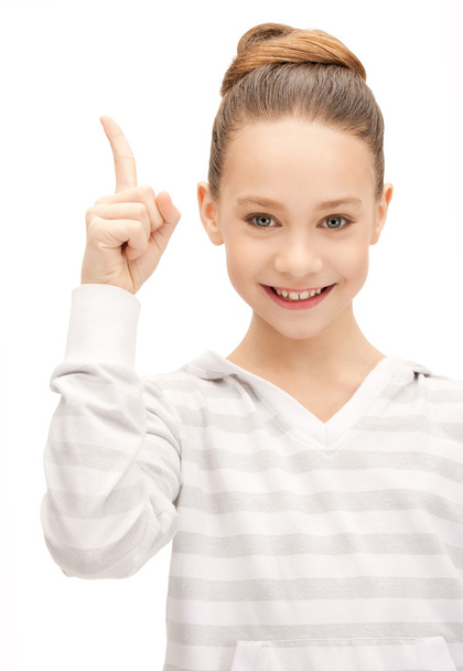 Teenage girl with her finger up - Фото, зображення