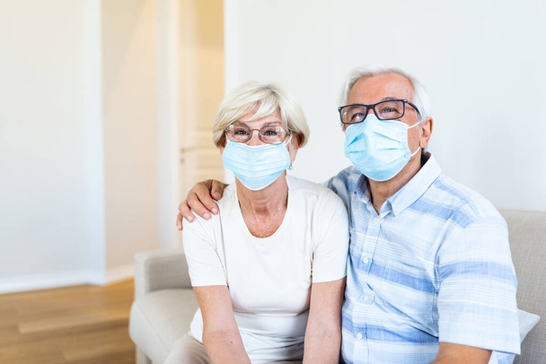 Close up portrait of sick elderly woman and man with facial masks - Foto, Bild