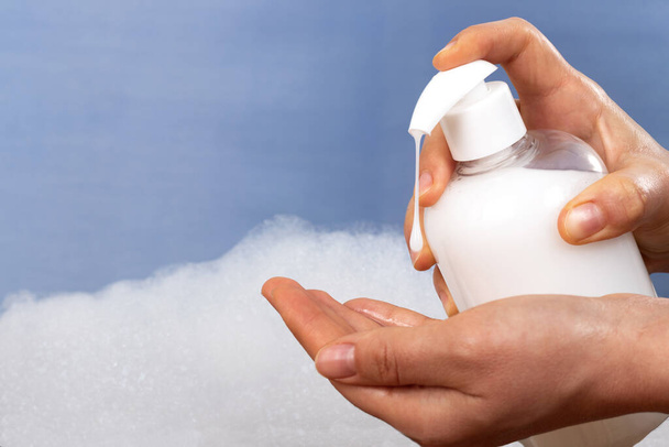 Close up photo of hand soap and bubbles. Hygiene and personal care concept. - Foto, Imagen