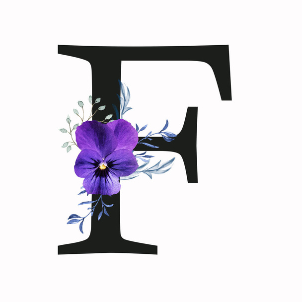 Capital letter F decorated with pansy flower and blue green leaves. Letter of the English alphabet with floral decoration. Floral letter. - Photo, Image