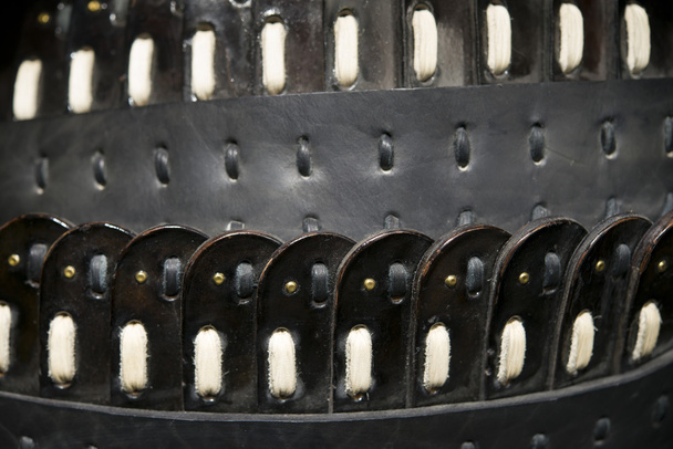Black leather decorative belt closeup - Φωτογραφία, εικόνα