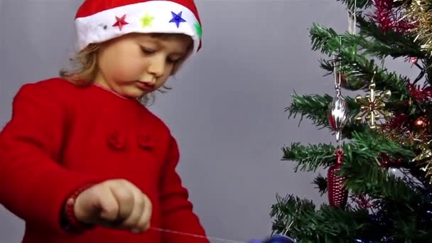 Happy small girl in Santa hat - Footage, Video