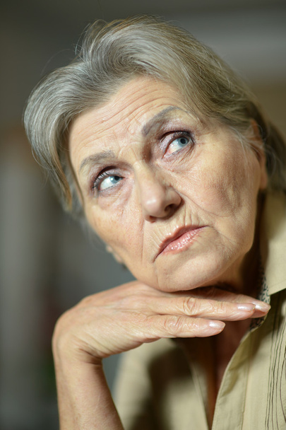 Sad aged woman at home - Photo, image