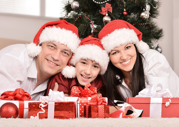 Family with christmas gifts - Foto, Imagen