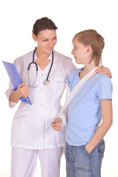 Doctor and young boy - Фото, изображение