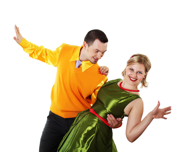 Young dancing couple in bright colour wear - Foto, Imagen