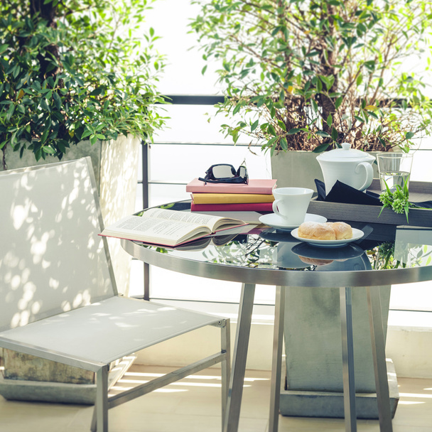 Coffee and bakery on table home terrace - Valokuva, kuva