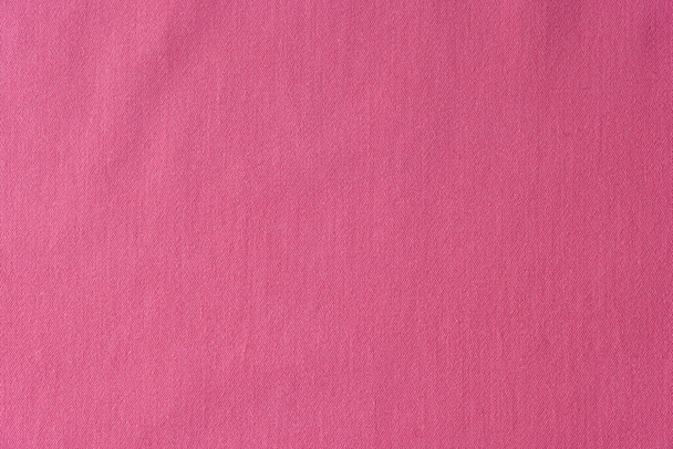 Top view of smooth pink fabric cloth texture for background and design art work. Rosy textile surface backdrop - Photo, image