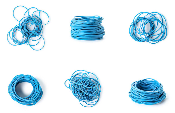 Set of blue elastic bands on white background - Foto, afbeelding