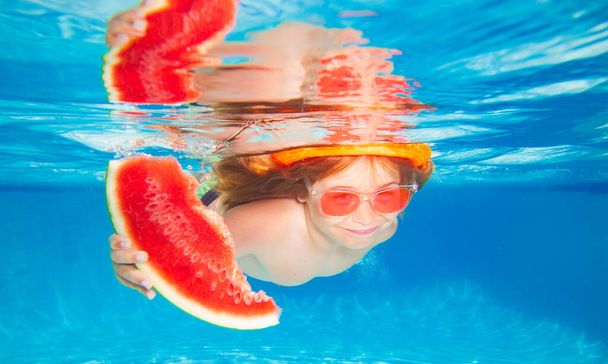 Summer watermelon. Funny kids boy play and swim in the sea water. Child swimming underwater in swimming pool. Summer travelling - Foto, Imagem