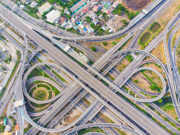 Intersection overpass transport road sunny day in city aerial view - 写真・画像