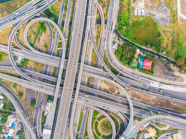 Intersection overpass transport road sunny day in city aerial view - Foto, Imagen
