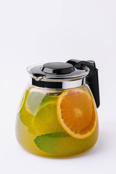 refreshing tea with lime and orange and mint - Photo, Image