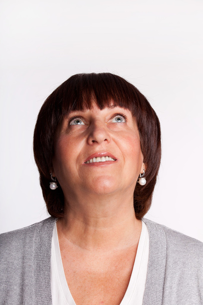Mature woman looking up - Photo, Image