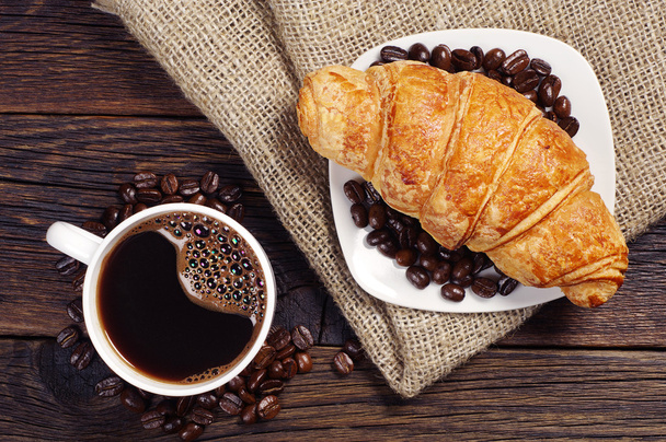 Cup of coffee with croissant  - Photo, Image