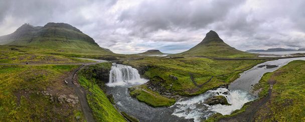 Drone view at mount and waterfall of Kirkjufell at Grundarfjordur on Iceland - Photo, Image