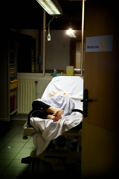 Patient in a night emergency box in a hospital center in France. - Fotó, kép