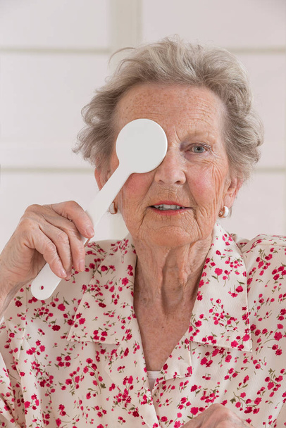 Sight test senior woman - Photo, Image