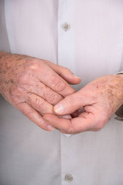 Senior man suffering from hand pain. - Fotó, kép