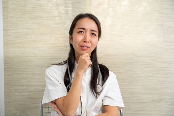 Asian doctor woman in teleconsultation - Fotografie, Obrázek