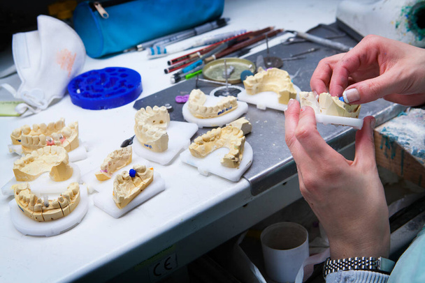 Computer-aided manufacturing of dental prostheses. - Photo, Image