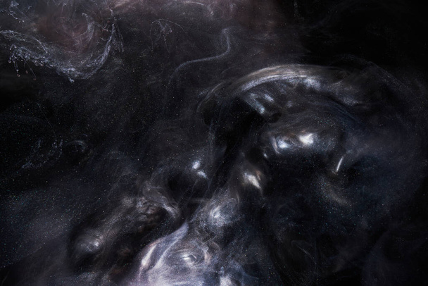 Liquid fluid art abstract background. Dark multicolored smoke dancing acrylic paints underwater, space ocean, universe explosion - Foto, Imagem