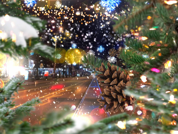 festive city night Christmas tree view on street night city  car traffic pedestrian walk garland illumination with cone snow flakes street holiday scene - Photo, image