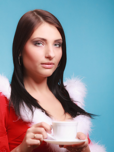 Woman holding cup of hot beverage - Valokuva, kuva