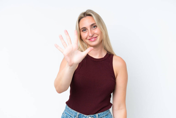 Young caucasian woman isolated on white background counting five with fingers - Photo, Image