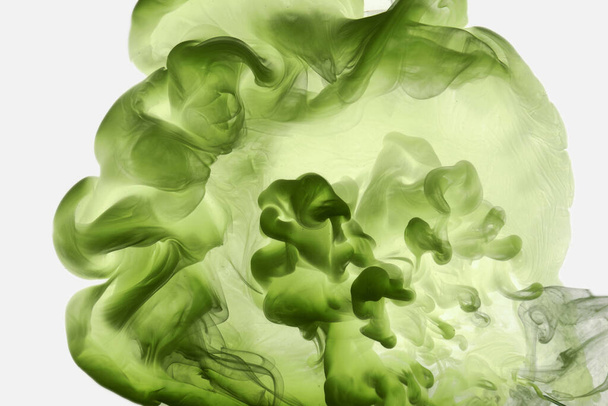 Green smoke abstract background, acrylic paint underwater explosion - Foto, Bild