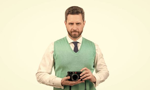 guy hold photo camera. amateur and professional photography. shooting session isolated on white. photoshoot. photographic work. taking pictures. male photographer. smiling man photographing. - Photo, image